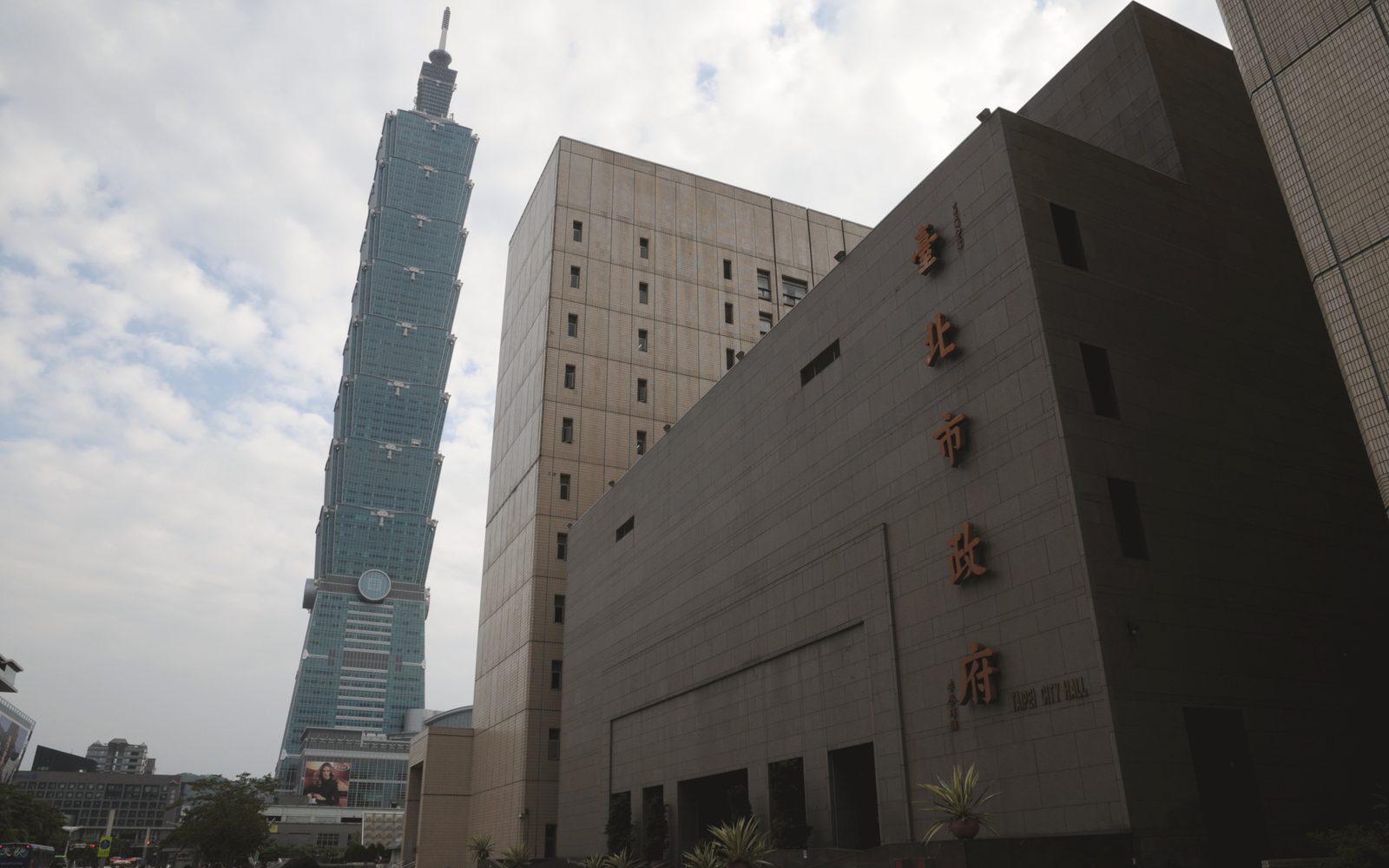 Taipei skyline with Taipei 101 rising above the city blocks, used here as a local ambient image.